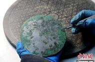 陕西墓地惊现80余枚千年汉代铜镜